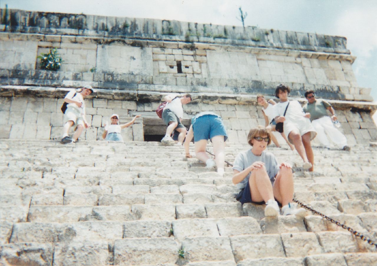 Visitors at the base of El Castillo pyramid at Chichén Itzá