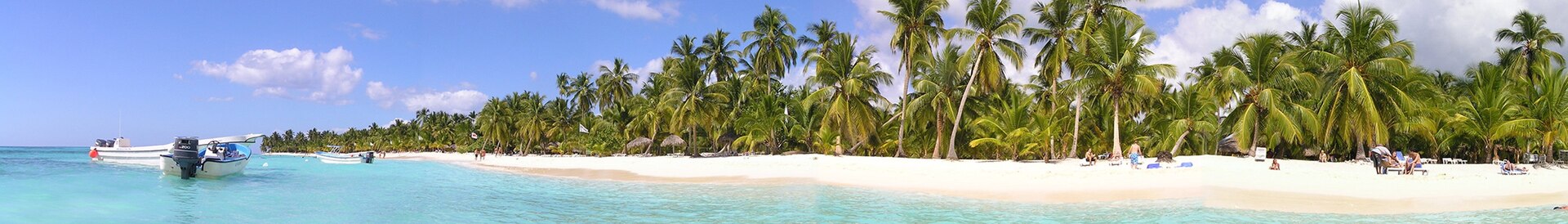 Boats and turquoise shallows near Isla Saona, Dominican Republic