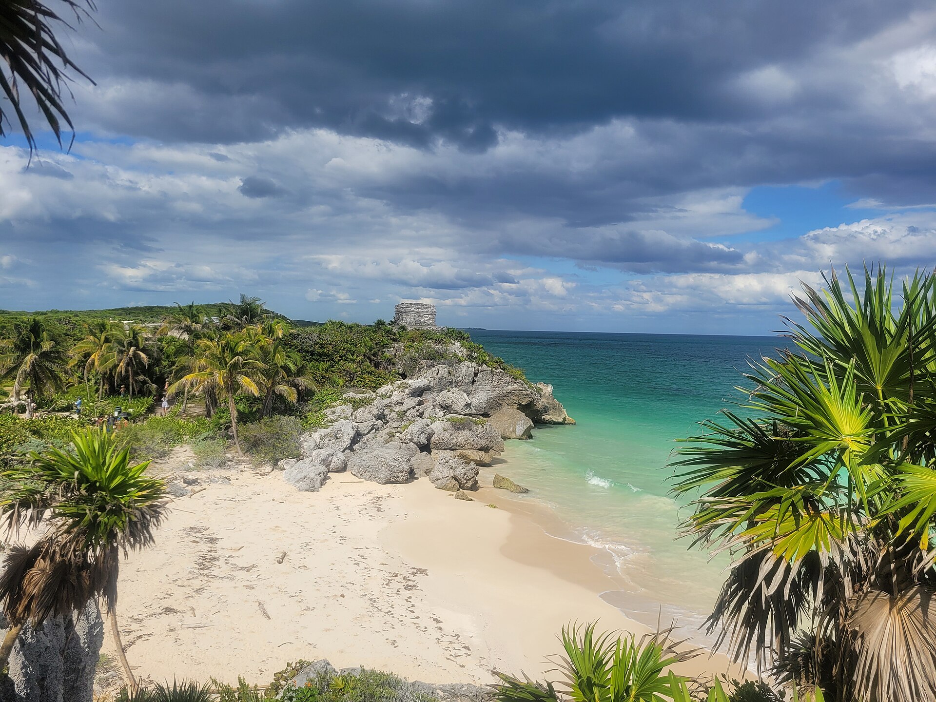 Tulum archaeological site with stone ruins above a palm-fringed beach